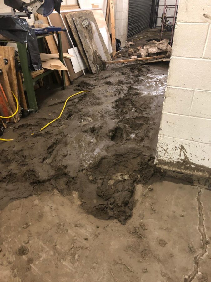 Mud covered the floors of the maintenance area when the water main ruptured.