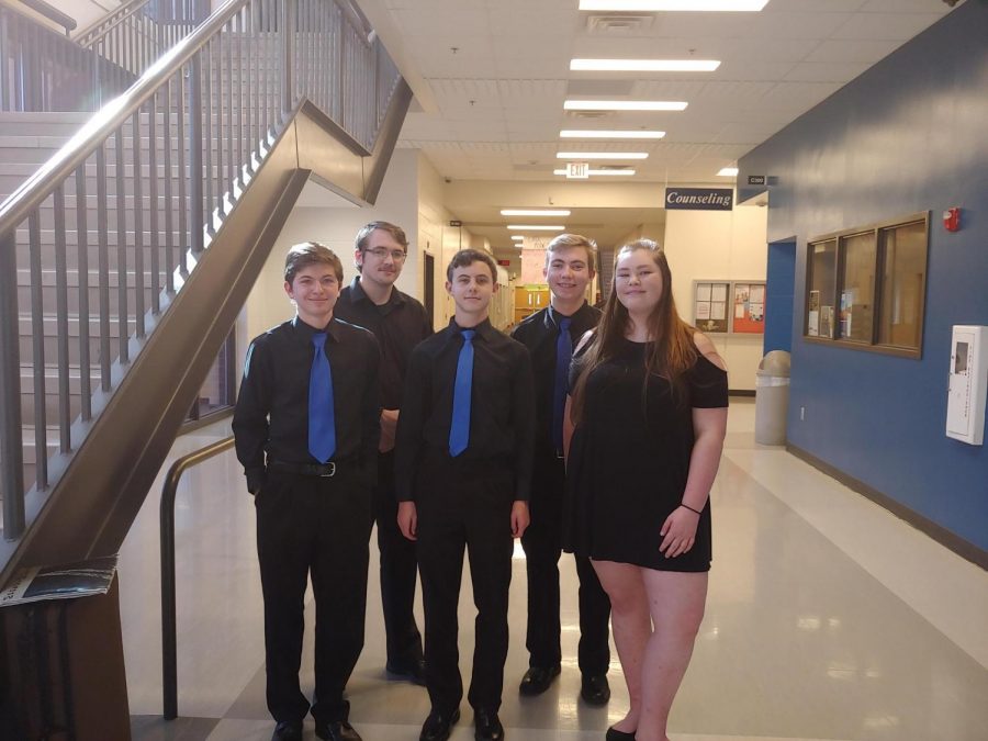 Doherty orchestra students pose at their competition on April 5th.