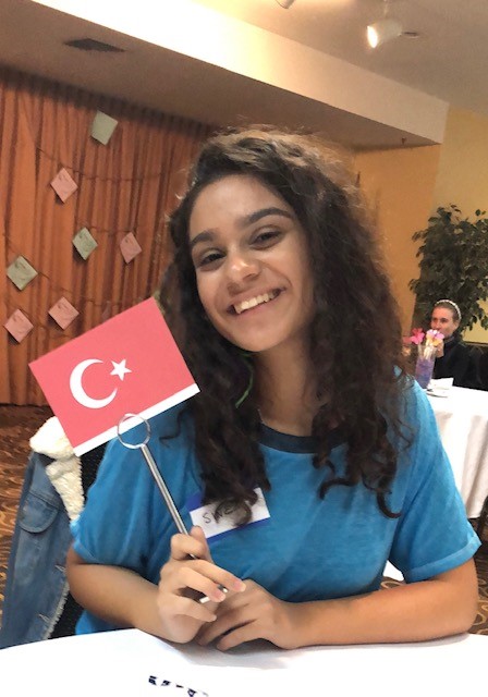 Sinem showing off the Turkish flag.