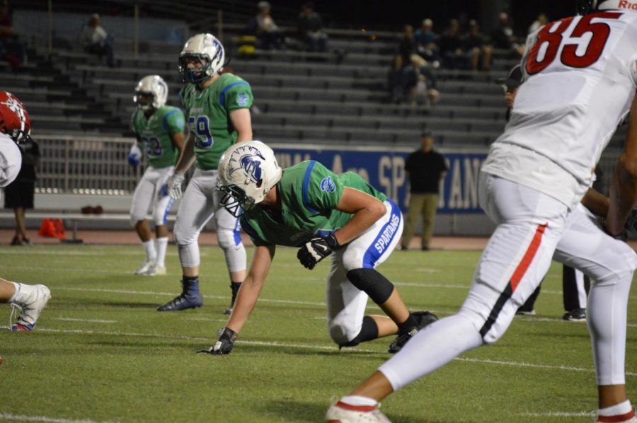 Wide receiver Kade Unberhagen  gets ready to run down the field for a catch. 