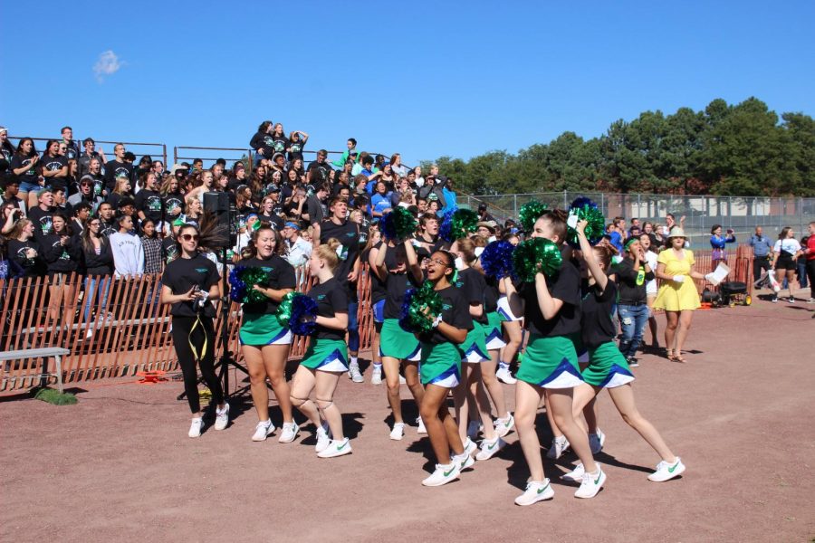 Poms+celebrate+during+the+2019+pep+rally+held+outside+during+September.