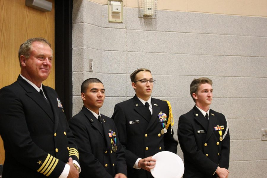 Captain Craig Thomas, JROTC instructor, Cadet Juan Cardona, Cadet Cody Jackson, and Cadet David Taylor.