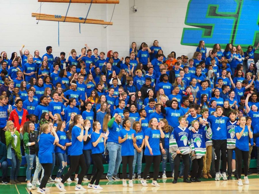 The sophomore and freshman student section watching the Granny-Style Shoot Out competition.