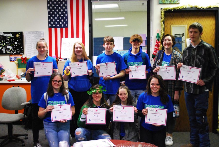 2019-2020 Winners from the Doherty Reflections contest pose with their certificates.