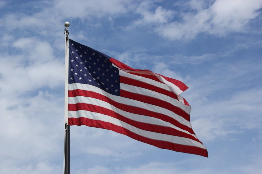 An American flag flaps in the wind.