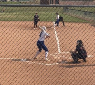 Batted up at base, Jasmine Costa gets ready to strike a home run!