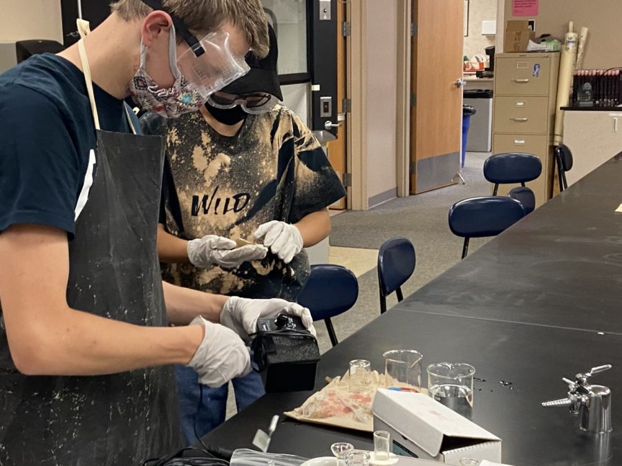 Chemistry students working on lab in masks.