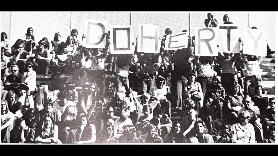 Students hold Doherty signs in 1976 yearbook.
