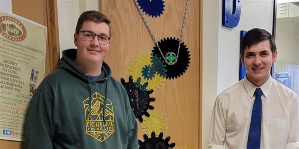 Seniors Tylor Huff (left) and William Pado (right) pose for photos at Doherty High School. The Daniels Scholarship is highly competitive and having two winners from one school is a rare event.