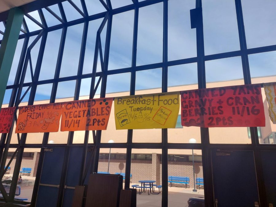 Doherty High School staff and students start to see the colorful posters for harvest of love. Last year near the end of October students where excited about the Harvest of Love assembly. " I love being able to bring people happiness for food collecting." Pyper Adlrich said"