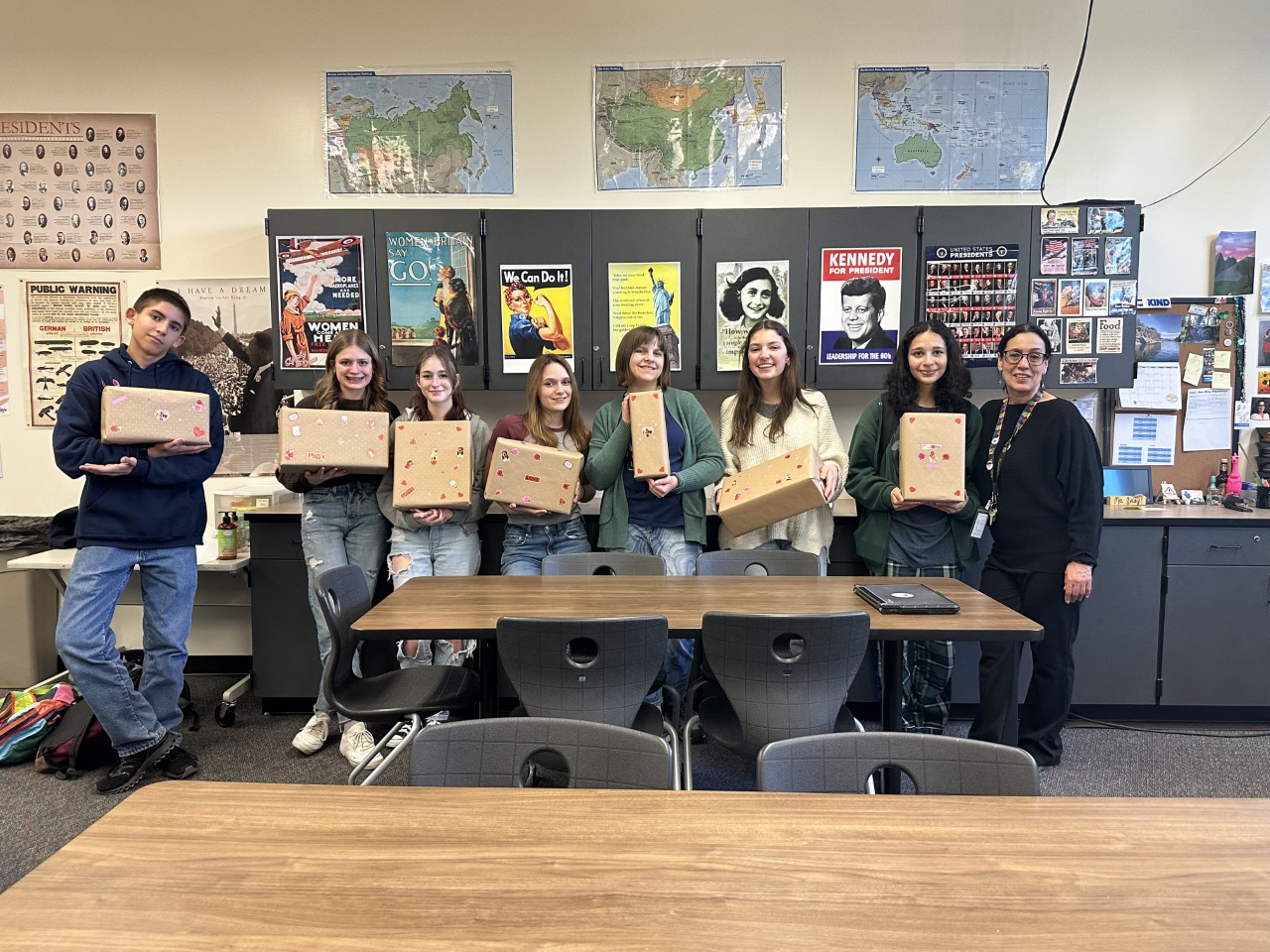 Environmental Club holding the boxes that they decorated themselves. These said boxes will be given to The Place Wednesday. I hope this opens more opportunities said Ms. Seay
