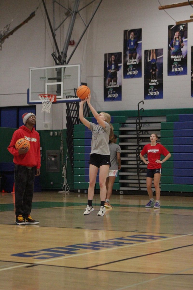 Jada Symons shooting during 6 a.m practice. 