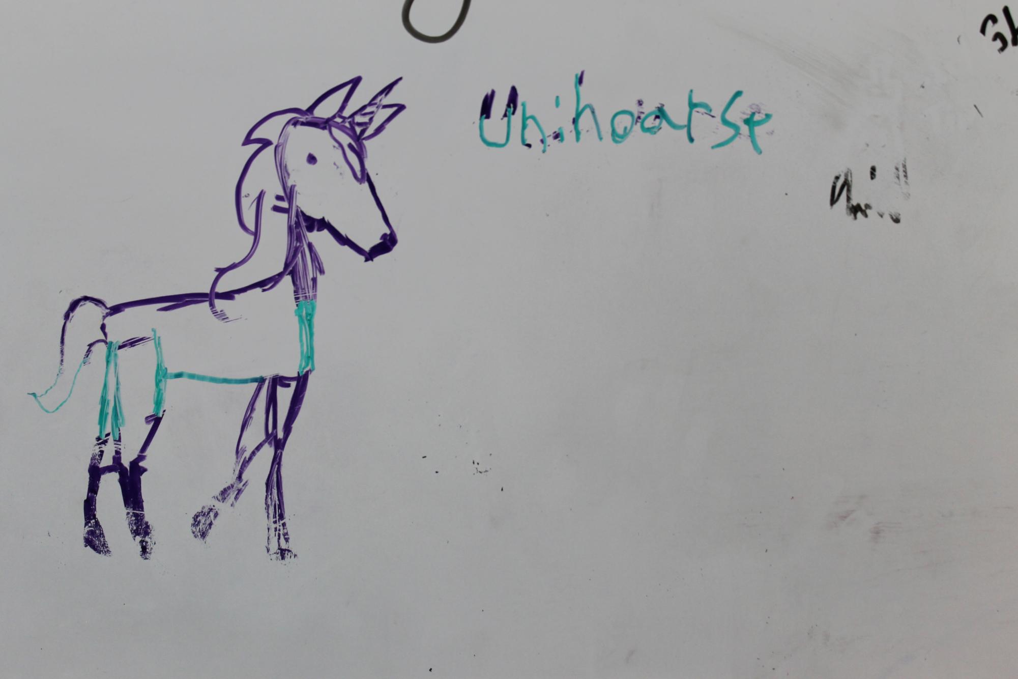 The Mysterious Unihoarse drawn by a unknown creator, Recently rudely partially erased and then repaired by me with a green expo marker. 