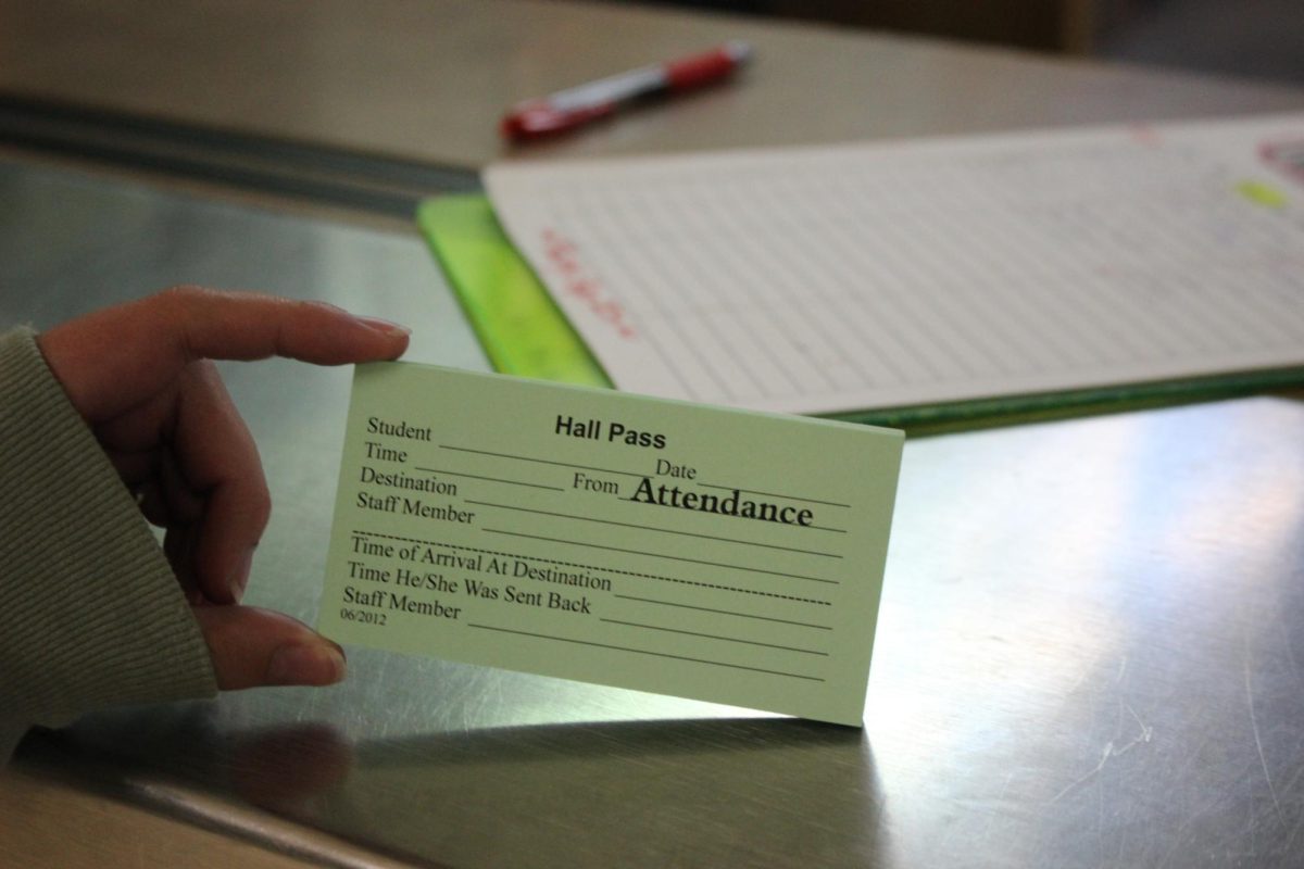 Tardy pass from the attendance office, late students will enter and will have to pick up either an excused or unexcused pass before heading to class.