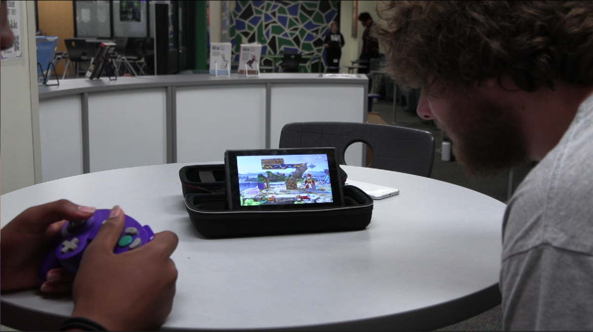 MarbleD & sematary playing Super Smash Bros. in the Media Center.