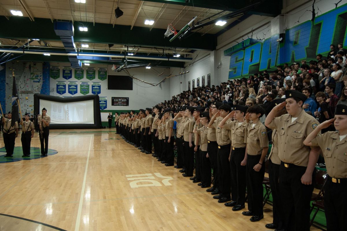 Outstanding NS1 cadets saluting the veterans and U.S. flag during the Veterans Day Assembly on November 9th, 2024.