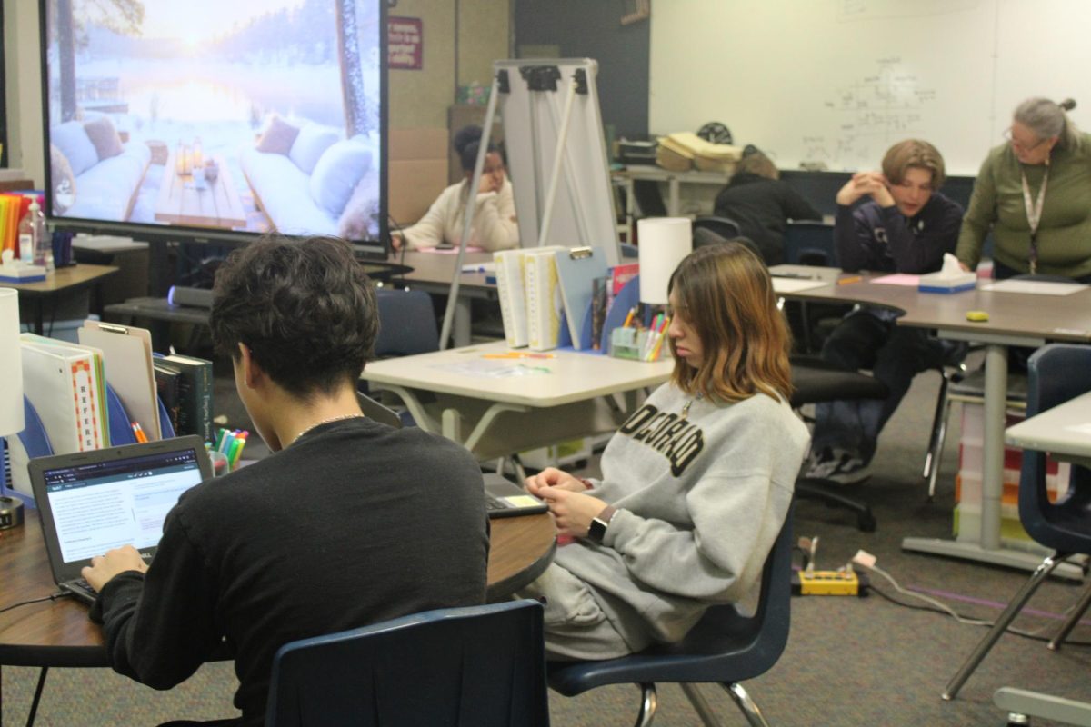 Students work hard in the writing  center. 