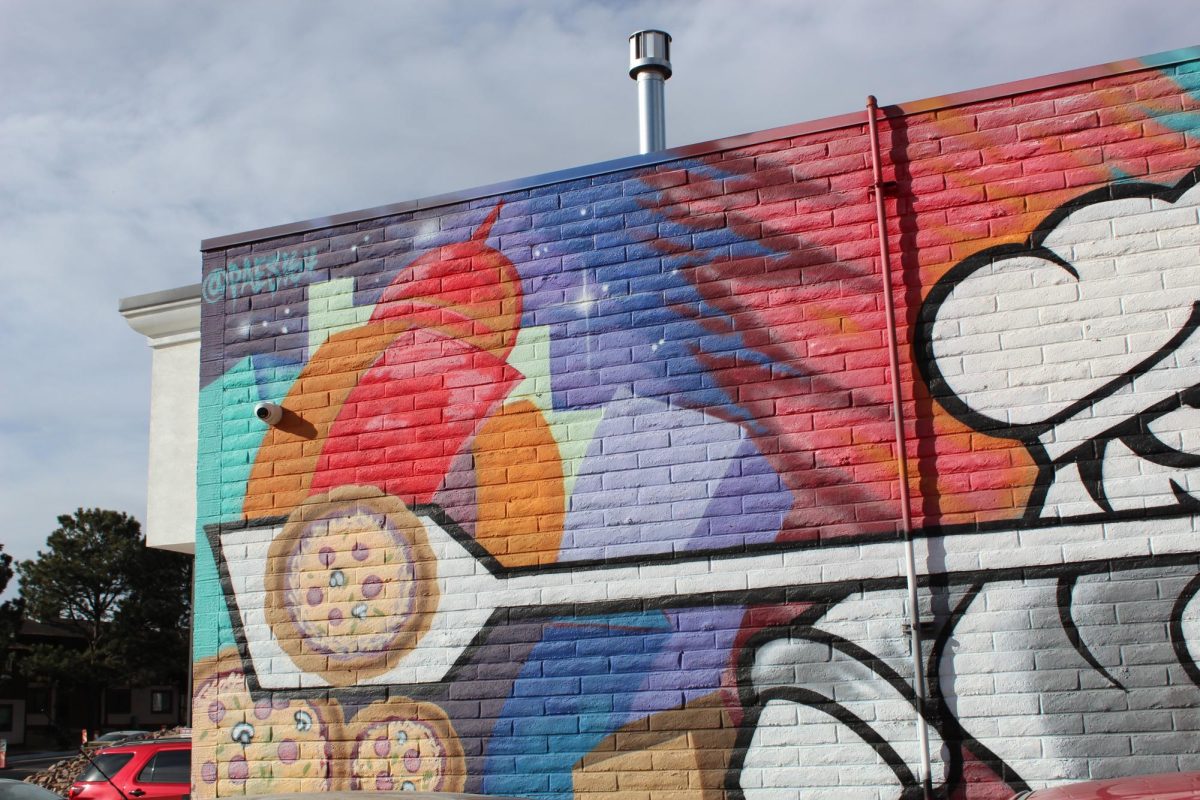 Left side of the mural on the side of Slice 420 Pizzaria 
