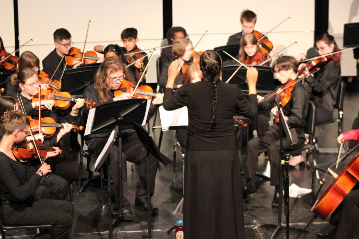 Sabrina Baugh conducts the Symphonic Orchestra during their concert, which took place on April 29th.