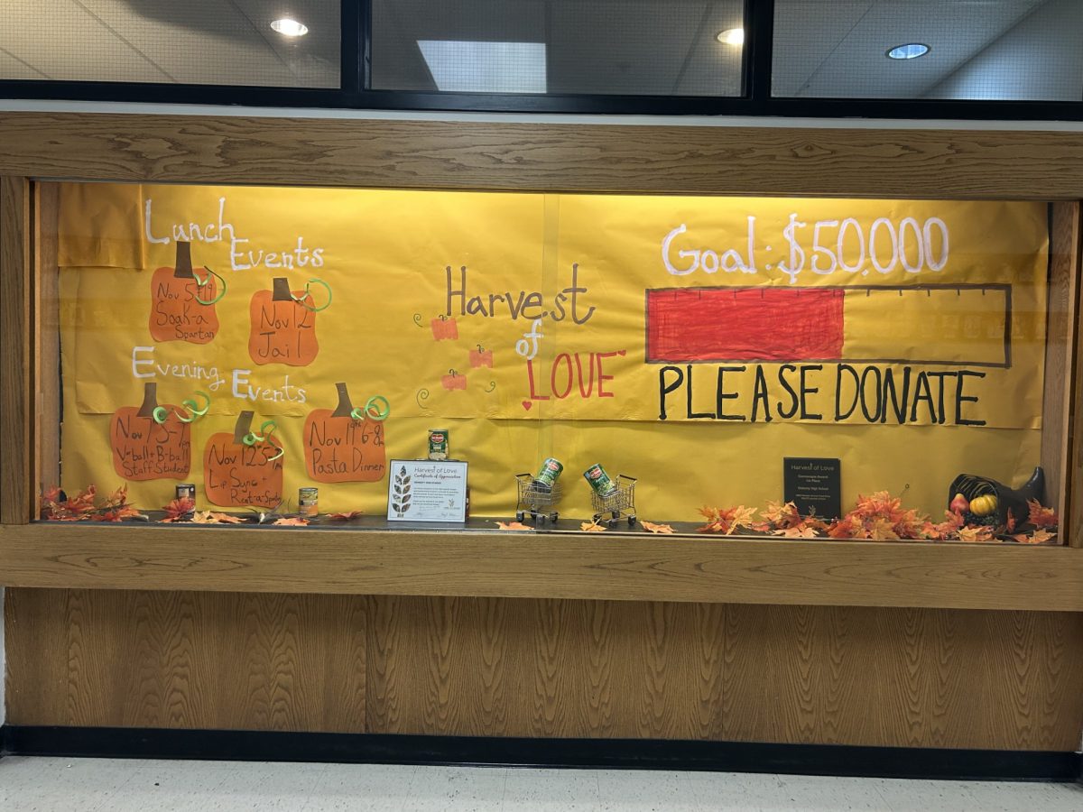 Harvest of Love showcase near the main office, spreading Thanksgiving spirit.